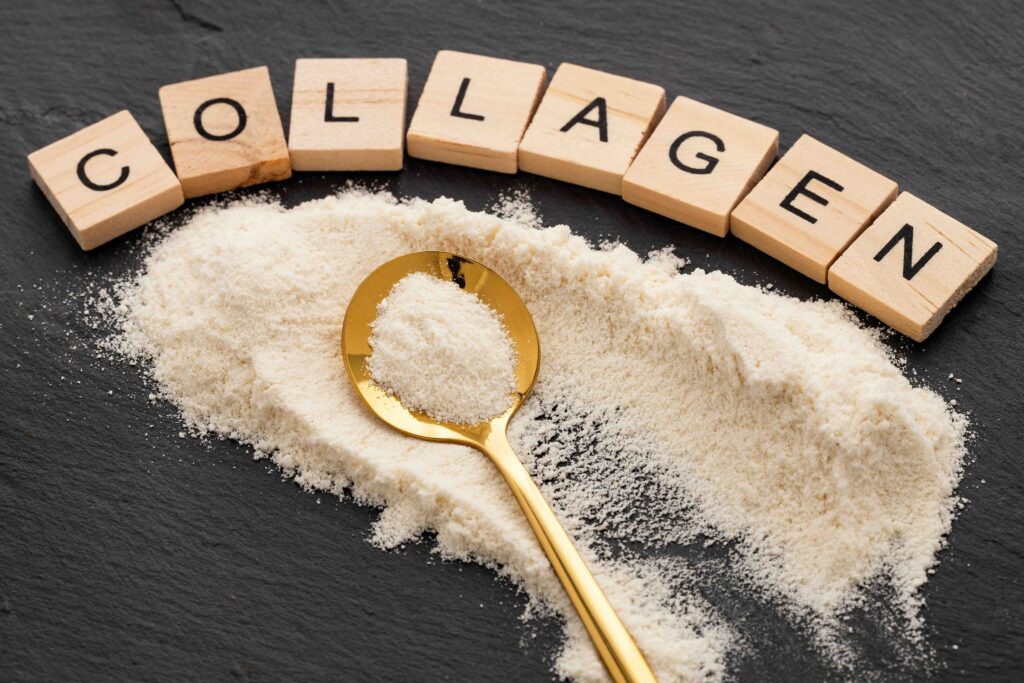 Collagen protein in the spoon - Organic gelatin powder.