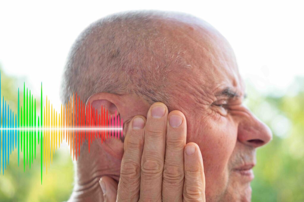 senior man ear closeup listening, sound wave, acoustics Auditory System, Hearing Test, Cochlear implant, Assistive listening device